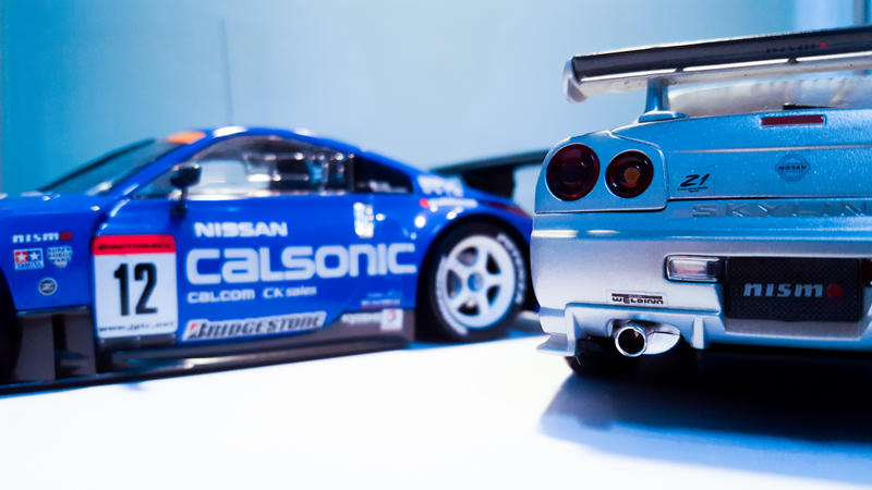 The silver R34 can be seen reviewed here: http://liveandletdiecast.kinja.com/jdmonday-the-jdm-cdm-1703441816